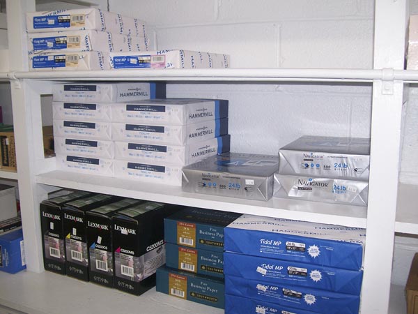 Shelves of printing paper and supplies