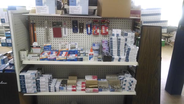 Shelf of office supplies