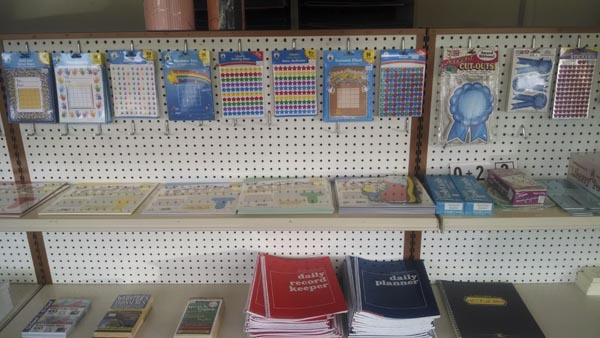 Notebooks and planners on shelves